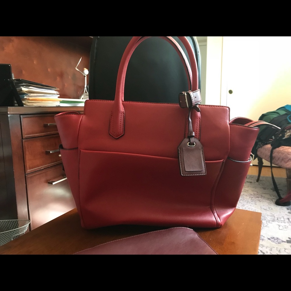 Red leather satchel bag. Multi pocket.